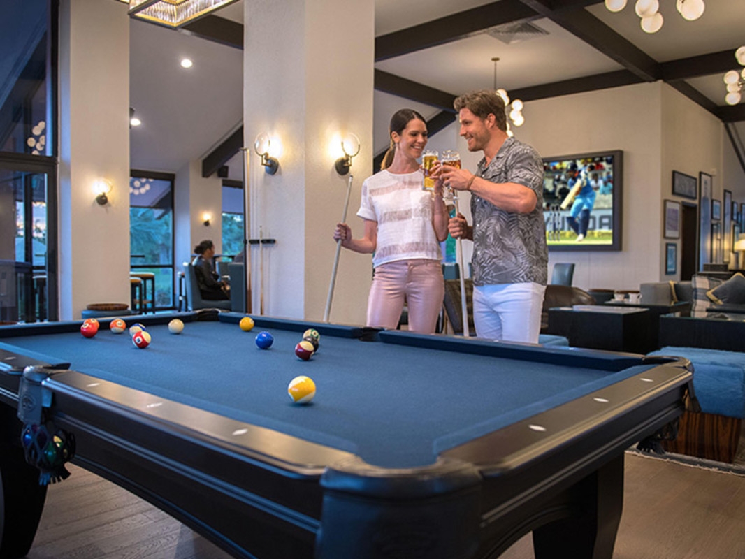 Boundary Sports Bar and Grille – Couple Playing Pool At Boundary