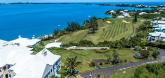 An aerial view of Tuckers Point Golf Club on the edge of the ocean.
